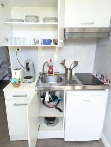 Appartements Grands Studios Maillochon acces Gare de Poitiers et Centre ville a Pieds : photos des chambres
