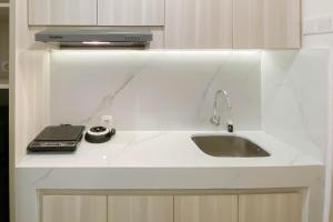 Minimalist and Simply Look Studio Tokyo Riverside PIK 2 Apartment By Travelio