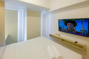 Minimalist and Simply Look Studio Tokyo Riverside PIK 2 Apartment By Travelio