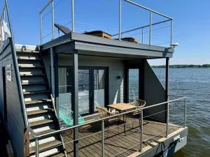 Hausboot bikini mit Dachterrasse in Schleswig am Ostseefjord Schlei - Шлезвиг