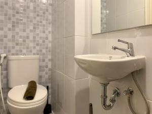 Minimalist and Nice Studio at Tokyo Riverside PIK 2 Apartment By Travelio