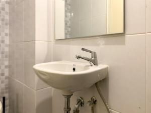 Minimalist and Nice Studio at Tokyo Riverside PIK 2 Apartment By Travelio