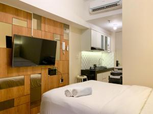 Minimalist and Nice Studio at Tokyo Riverside PIK 2 Apartment By Travelio