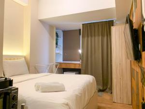 Minimalist and Nice Studio at Tokyo Riverside PIK 2 Apartment By Travelio