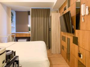 Minimalist and Nice Studio at Tokyo Riverside PIK 2 Apartment By Travelio