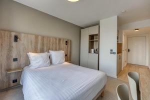 Appart'hotels KOSY APPART-HOTELS - Residence du Lac : photos des chambres