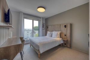 Appart'hotels KOSY APPART-HOTELS - Residence du Lac : photos des chambres