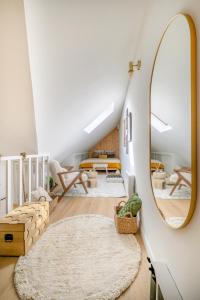 Appartements Jacuzzi Sauna privatif - La Cabanette Spa : photos des chambres