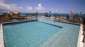 Porto Atlantis - Flats a 50m da Praia de Porto de Galinhas por Yolo