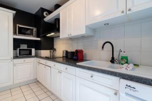 Appartements Vieux Lille - Appartement avec terrasse + parking : photos des chambres