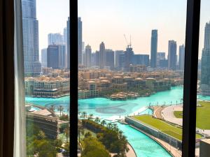 ADDRESS Residences Opera 2BR Tower 1 - EPIC 30th floor Burj Khalifa view byBLCK with DXB AIRPORT VIP Shuttle option