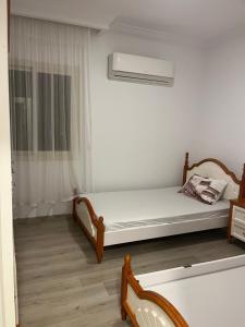 NEW CAPITAL FRONT OF SPORTS city