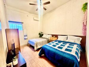 Departamento centrico, 2 habitaciones , 4 camas matrimoniales, 1 bano completo, 1 estacionamiento - Apartments, Cabo San Lucas