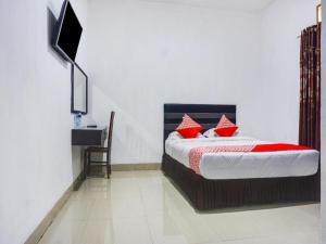 Capital O 91534 Wisma Metro Permai