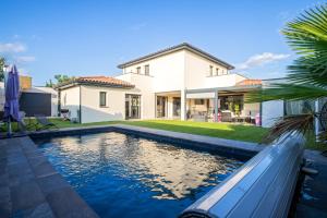 Villas Maison Architecte avec Salle de Cinema : photos des chambres