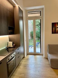 LR Deluxe Apartments - Porta Venezia - Bilocale con Giardino Privato
