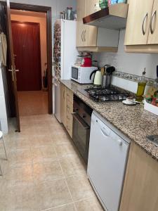 Habitación para chica en vivienda compartida con anfitrión hombre