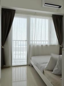 Cozy and Homey 1BR Condo at SMDC South Residences