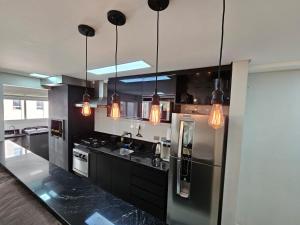 Apartamento clube 2 quartos com suíte e garagem