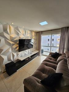 Apartamento clube 2 quartos com suíte e garagem