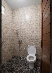 Dedyluminous Homestay Tanah Lot by Smart Digital