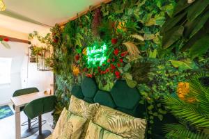Appartements Studio La Jungle bellifontaine : photos des chambres