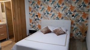 Sejours chez l'habitant Petit nid cosy : photos des chambres