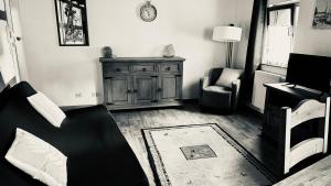 Appartements Les gites de la poterne : photos des chambres