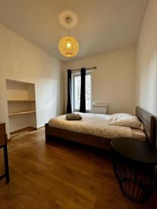 Appartements Ravissant T3, calme et central : photos des chambres