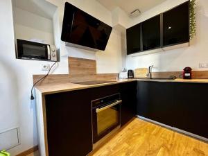 Appartements Ravissant T3, calme et central : photos des chambres
