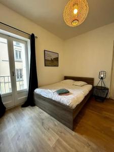Appartements Ravissant T3, calme et central : photos des chambres