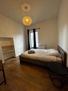 Appartements Ravissant T3, calme et central : photos des chambres