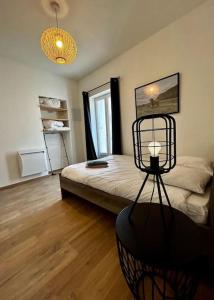 Appartements Ravissant T3, calme et central : photos des chambres