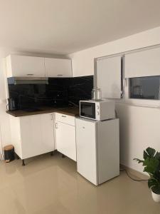 Studio Élégant Près de Tous Commerces et Gare RERC