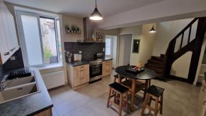 Appartements Le Grand Bourgeois : photos des chambres