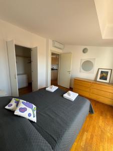 Appartamento Isola- Attico con Balcone