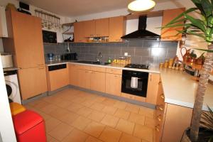 Appartements Grand appartement avec sauna : photos des chambres