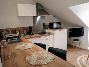 Appartements Les studios de la gare linge cafe the inclus wifi : photos des chambres