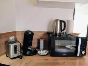 Appartements Les studios de la gare linge cafe the inclus wifi : photos des chambres