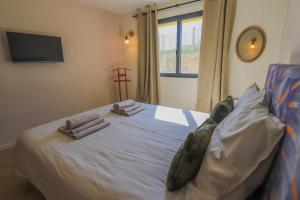 Maisons de vacances Magnifique maison moderne avec acces direct a la mer : photos des chambres