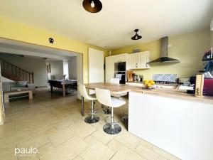 Appartements Maison Au Puits Beriol : photos des chambres