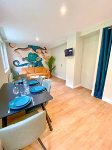 Appartements L-Octopus - Appartement 2 adultes 2 enfants Jardin, proche centre et Plage : photos des chambres