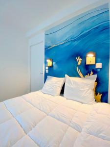 Appartements L-Octopus - Appartement 2 adultes 2 enfants Jardin, proche centre et Plage : photos des chambres