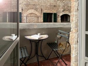 LA LOGGIA DI PORTICA Residenza Storica nel centro di Assisi