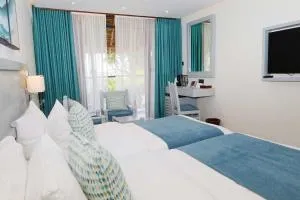 保巴博温泉海滩度假酒店 - 查勒岛