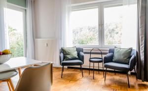 janu-homes - 3 Zimmer Apartment - 7 Betten, Lahnblick vom Rheinberg