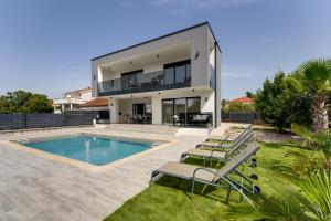 Beautiful new villa with a pool near beach - by TRAVELER tourist agency Krk ID 2410