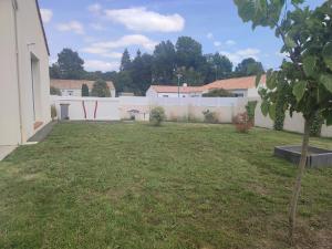 Maisons de vacances Maison de vacances, cosy, boheme chic, avec jardin! : photos des chambres