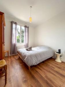 Maisons de vacances Maison Cosy avec Jardin et Cheminee sur Vichy : photos des chambres