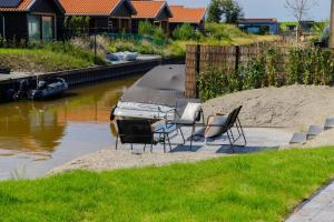 La Casita, Luxe Chalet Aan Het Water met Airco